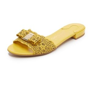 Used  ferragamo vara yellow flat sandals.